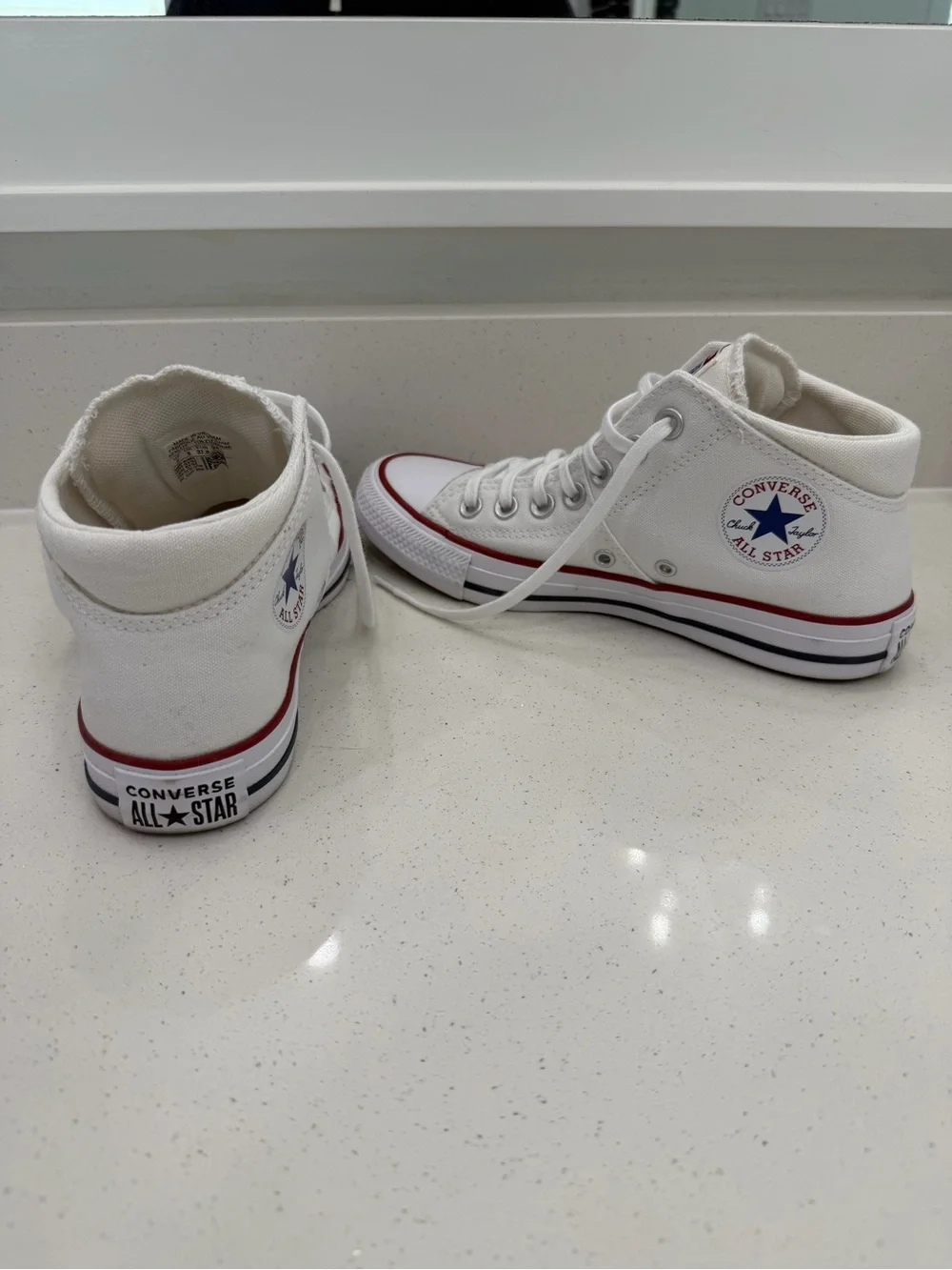 Converse White Low Top Sneakers with Red Accent
